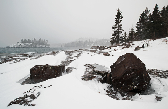 Snow Blowing on the Rocky Shoreline