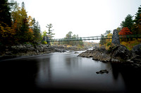 Swinging Bridge In Fall